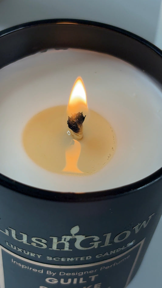 Masculine soy candle burning softly – bold aroma for premium interiors